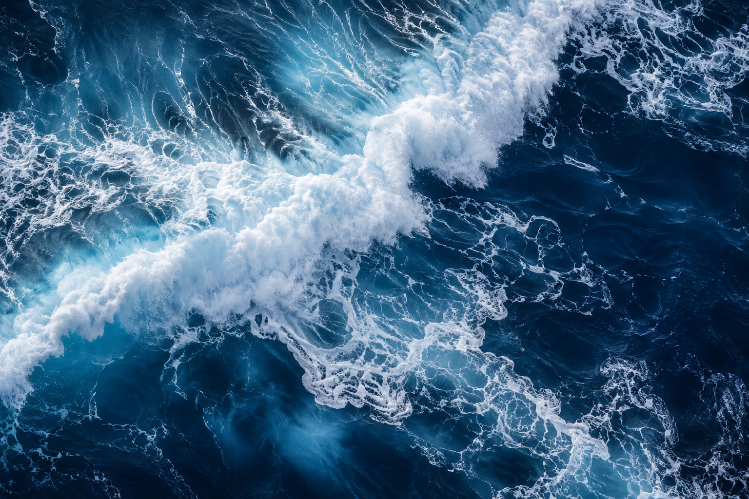 Deep blue ocean and white surf, the artwork used in the paper prints tour